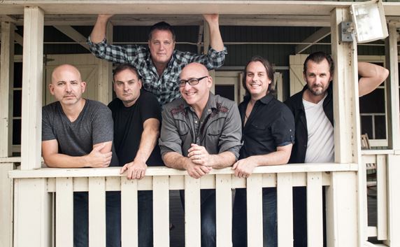 sister hazel six men standing on a porch