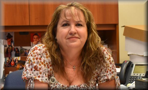 Esmerelda at her desk