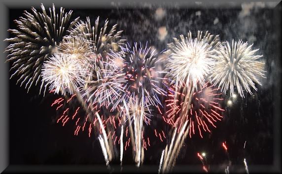 Fireworks exploding in the night sky