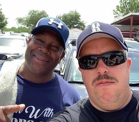 Officers Andre Stoudemire and Dave Heptinstall pose for a picture after 