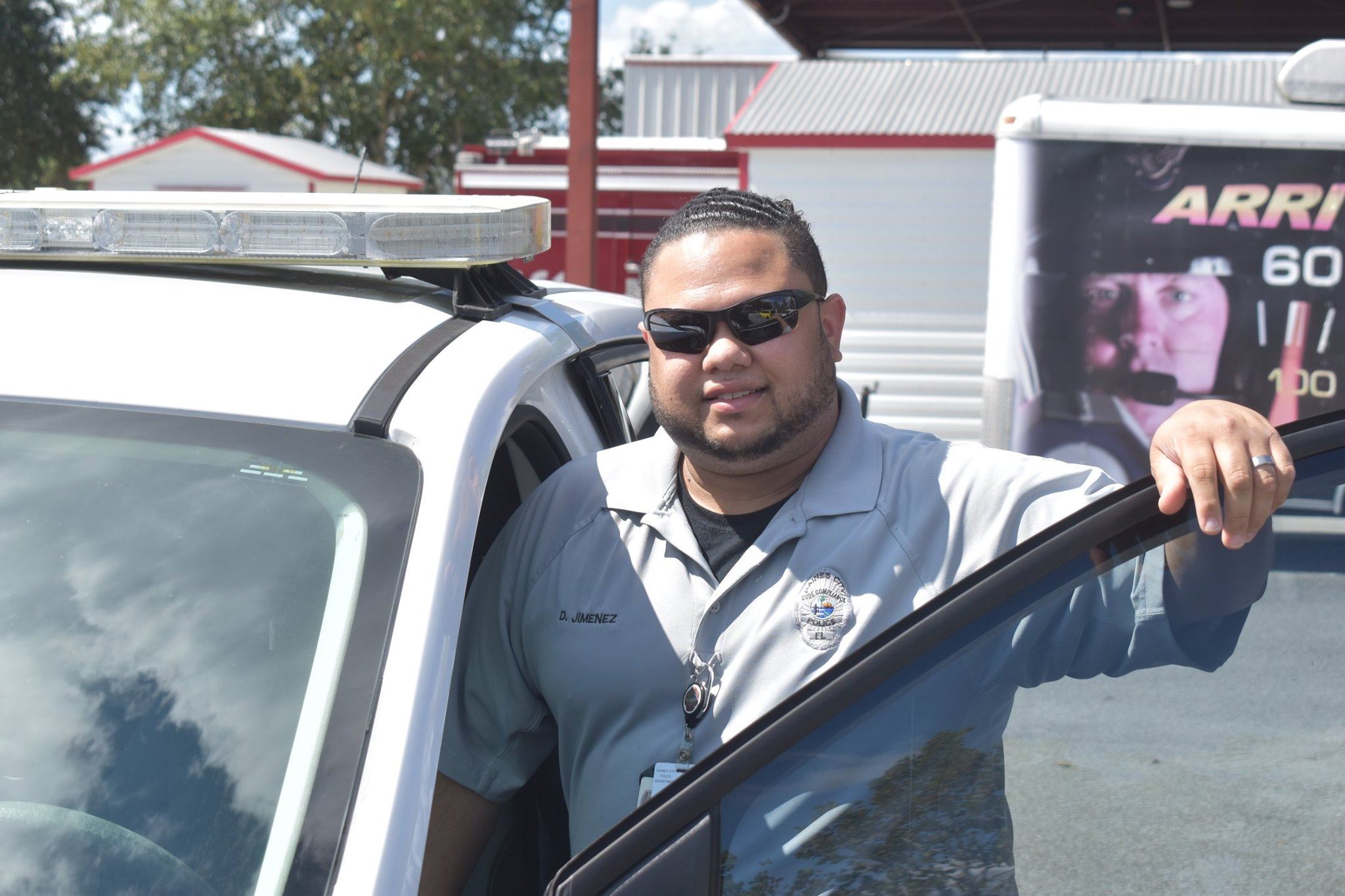 David Jimenez, the longest tenured Code Compliance Officer, steps into his vehicle.